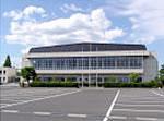 古川総合体育館の建物の外観と駐車場の写真